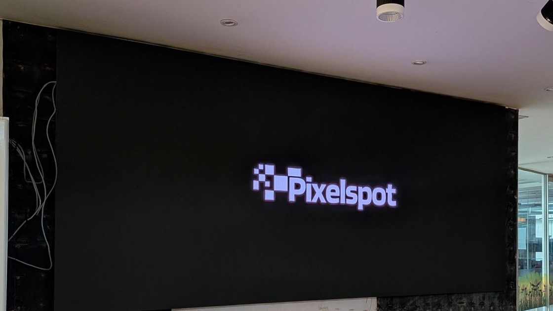 PixelSpot One Pro fine-pitch LED wall in a corporate boardroom