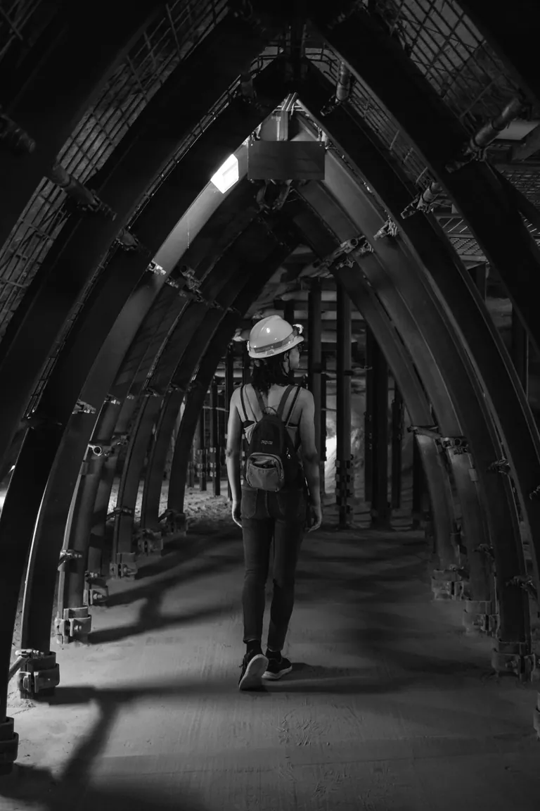 Person walking through a tunnel