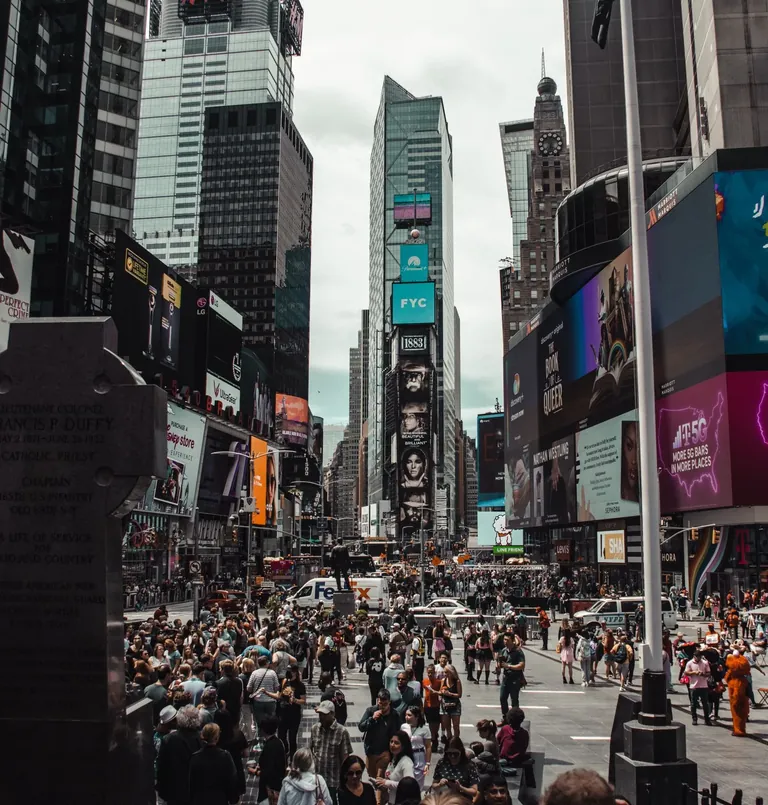 Digital billboards on a busy city square